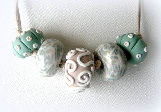 Polymer clay oblate necklace fearing my new seashell cane and urchin beads