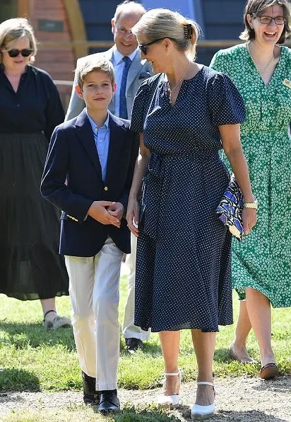 The Countess of Wessex wore a polka dot printed dress by ARoss Girl. ames Viscount Severn and Lady Louise Windsor