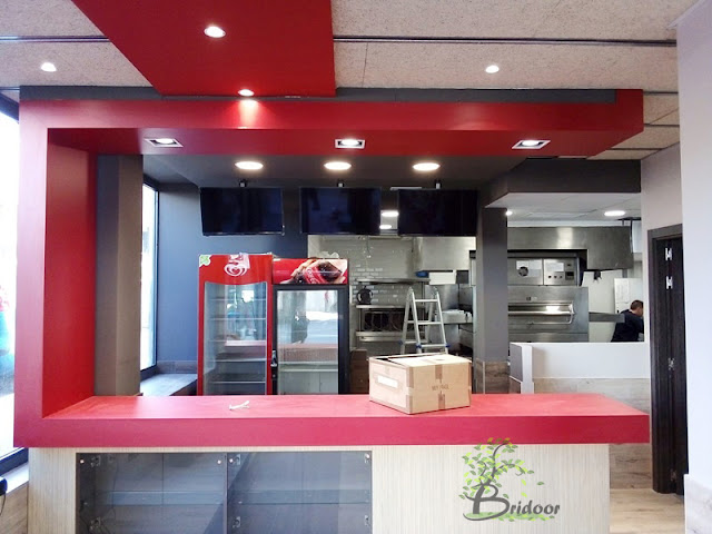 Mueble de madera a medida para una Pizzeria en Madrid