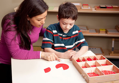 NAMC teacher presenting montessori lessons show don't tell fractions boy