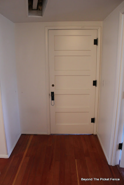 This Old House, mudroom, 5 paneled door, wood floor, http://bec4-beyondthepicketfence.blogspot.com/2015/07/before-projects-galore-in-my-old.html