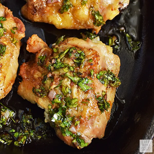 Chimichurri Chicken Thighs | by Life Tastes Good are easy to make, budget-friendly, and loaded with fresh flavors! The fresh herb Chimichurri Sauce has a slightly sweet, slightly tangy flavor that pairs nicely with the savory Pan-Roasted Chicken Thighs. #LTGrecipes
