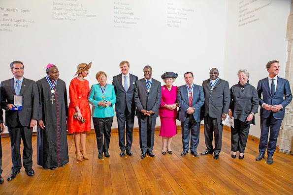 King Willem-Alexander, Queen Maxima and Princess Beatrix  attends the Four Freedoms Award ceremony in Middelburg. The International Four Freedoms Award is awarded to German chancellor Angela Merkel. Winners of the other awards are Mazen Darwish, Dr. Denis Mukwege. Queen Maxima wore Natan dress