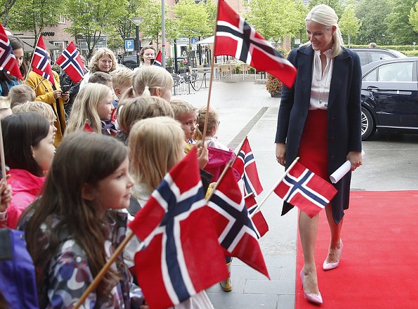 Crown Princess Mette-Marit of Norway travels on a Literary Train tour from Asker to Kristiansand 7 - 9 June. Prada pumps