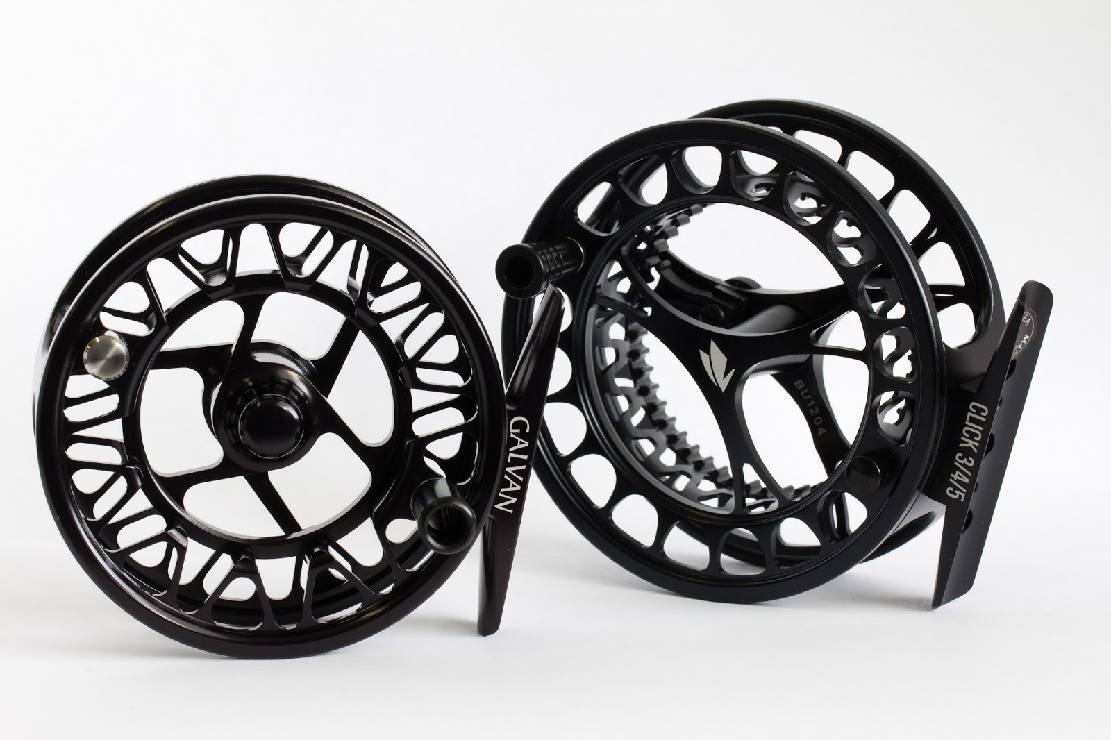 click and pawl fly reel