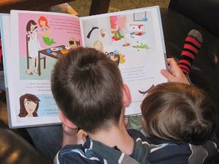 Two heads over a book