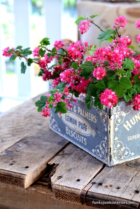flower arrangements in vintage tin vase