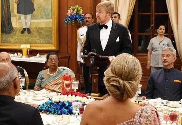 Queen Maxima wore a new bespoke evening gown by Jan Taminiau. Queen Maxima's diamond tiara and diamond earring