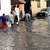 Residents Pose For Pictures In The Flood After Heavy Rainfall In Maiduguri (Photos)