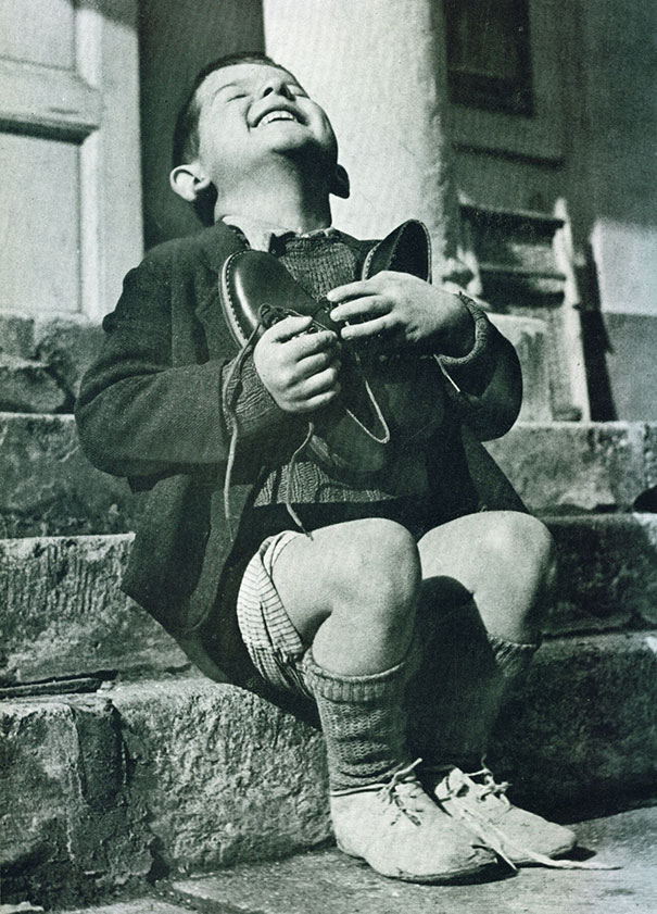 Austrian boy receives new shoes during WWII Austrian boy receives new shoes during WWII