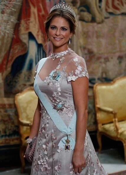 Queen Silvia wore a gown by Georg and Arend. Princess Madeleine wore a gown by Ida Sjöstedt. Princess Sofia wore a gown by Ida Lanto