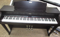 Roland HP506 digital piano
