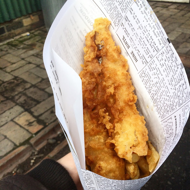 traditional fish and chips in paper cone 