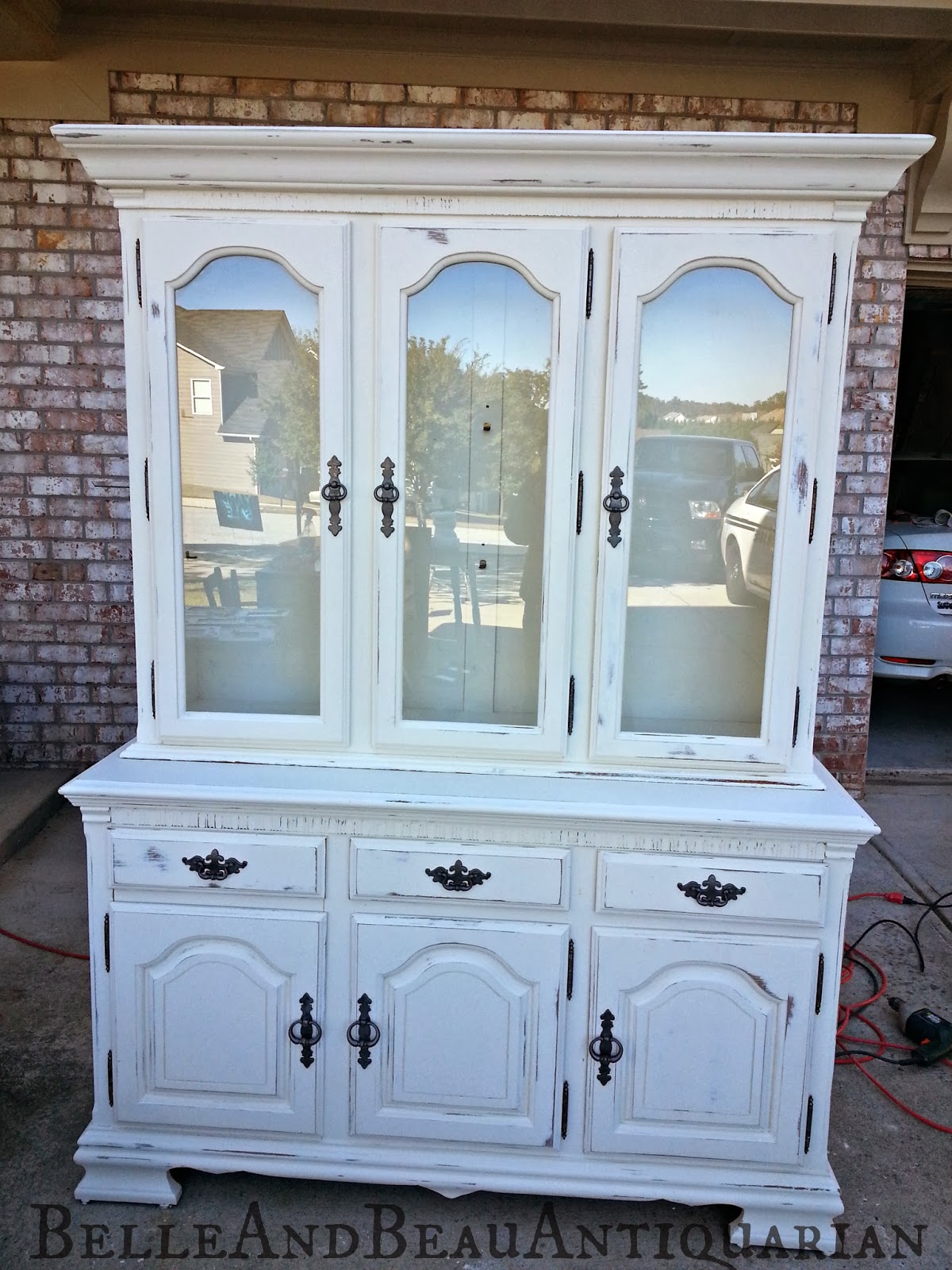 Belle Beau Antiquarian Distressed White China Cabinet With