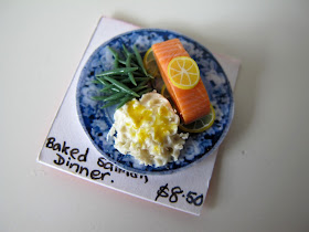 Baked salmon dinner in one-twelfth scale.