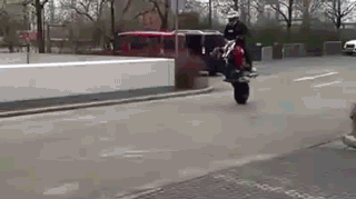 motorcycle stunt funny fail motorbike wheelie crash fail rider goes over wall fail funny