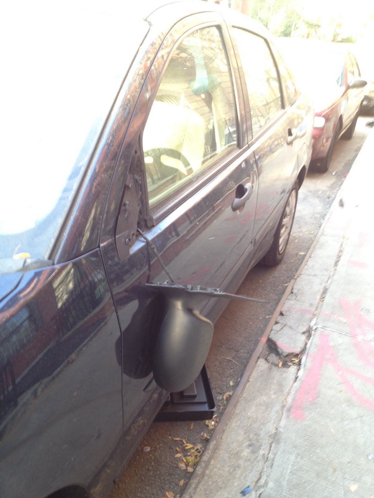 EV Grieve More Halloweenrelated vandalism? Smashed side view mirrors