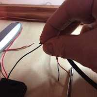 Connect the black wire from the battery to one wire on the switch