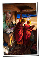 monks in Mekong river