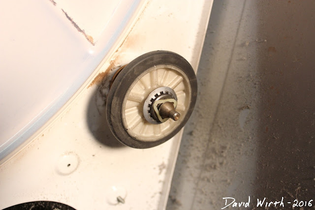 how to fix broken dryer belt, usually stuck wheel