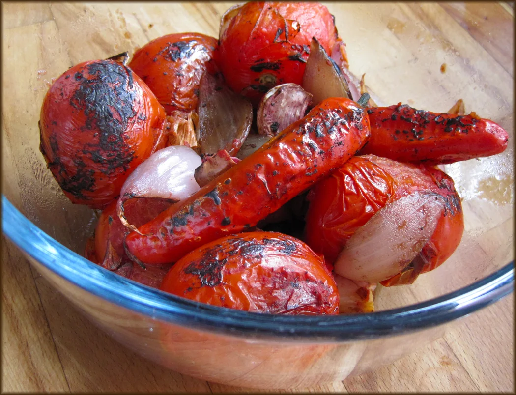 Charred tomatoes chillies and onions
