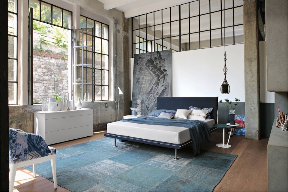 blue-rug-japanese-windows-eclectic-industrial-bedroom