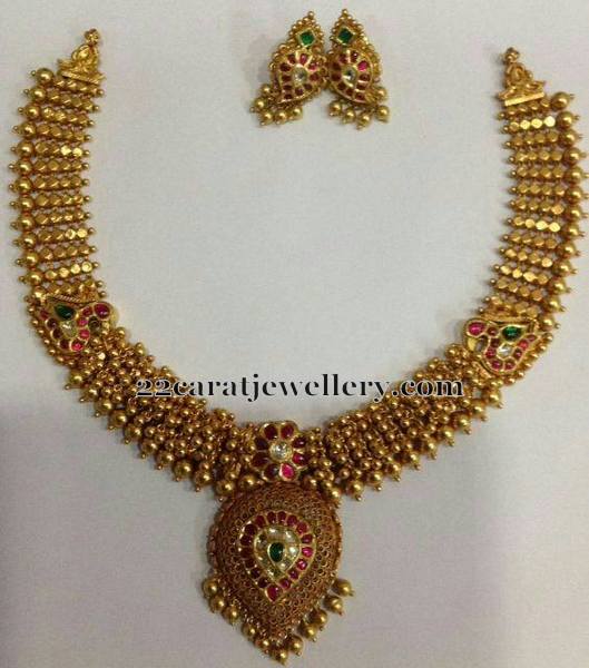 Gold Swirls Set with Mango Tops - Jewellery Designs