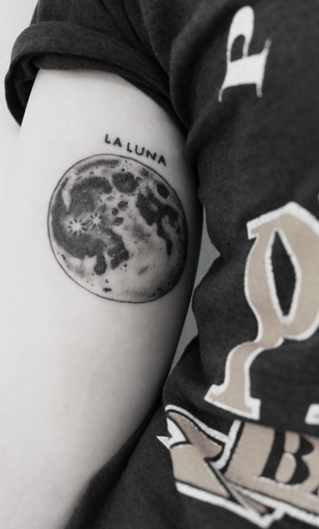 See more Full moon tattoo on upper arm with ink
