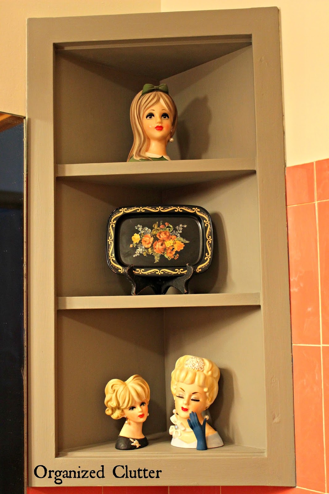 Head Vases & Tole Trays in a Vintage Bathroom www.organizedclutterqueen.blogspot.com