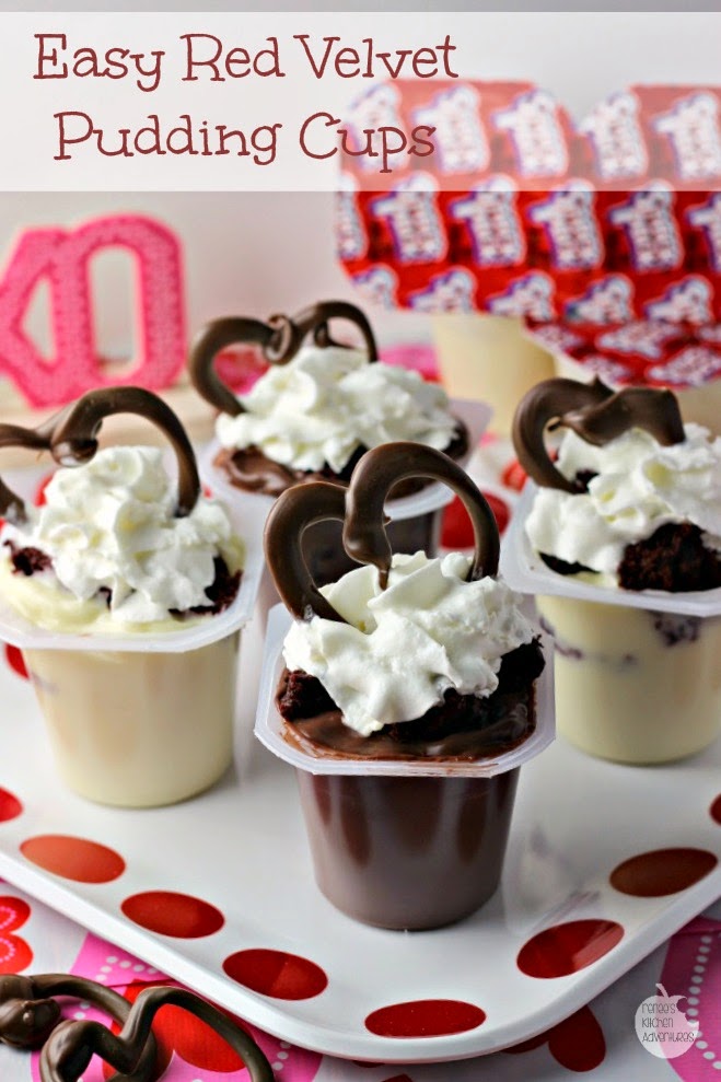 Easy Red Velvet Pudding Cups | pudding cups get decked out with red velvet cake pieces, whipped topping, and a chocolate heart just in time for Valentine's Day! 