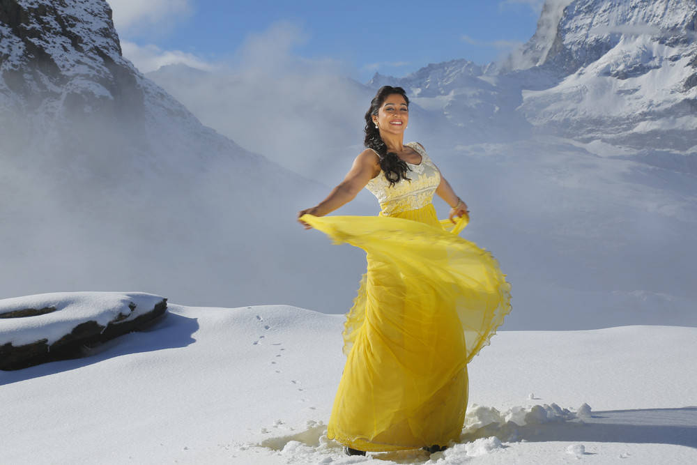 Regina Cassandra Stills From Soukyam Movie In Yellow Dress