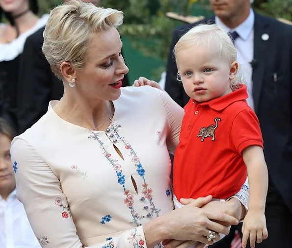 Prince Albert, Princess Charlene attend a dance show with Prince Jacques, the heir apparent to the Monegasque throne during the traditional Monaco's picnic - Pique Nique Monegasque at Le Parc Princesse Antoinette