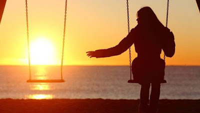 woman alone on a swing