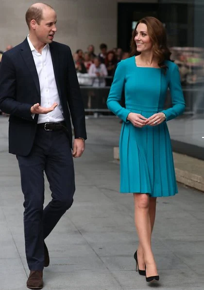 Kate Middleton is repeating her teal Emilia Wickstead dress and her Asprey leaf earrings. Kate is wearing a teal Emilia Wickstead dress