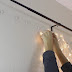 She Hangs Christmas Lights In Her Bedroom. When The Camera Zooms Out, The Result Is Amazing