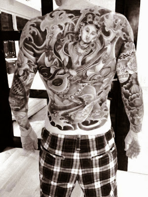 tatuaje de marcelo tinelli 2013 espalda