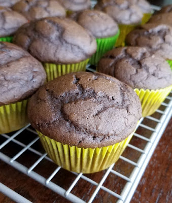 Chocolate cupcakes make simply with a cake mix and super soft and moist with pumpkin. Just a hint of spice lets you know that your fall cupcake dreams have come true! chocolate pumpkin cupcakes cooling on rack