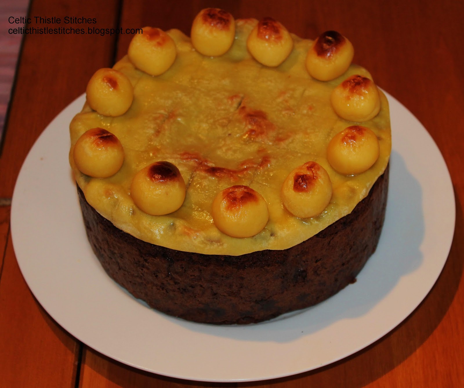 fruit cake with marzipan topping and eleven marzipan balls to represent the disciples minus Judas. Traditionally made for Easter