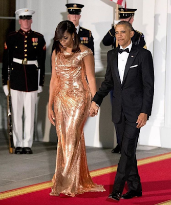 Image result for Michelle Obama dazzles in gold for the Obamas final state dinner(Photos)