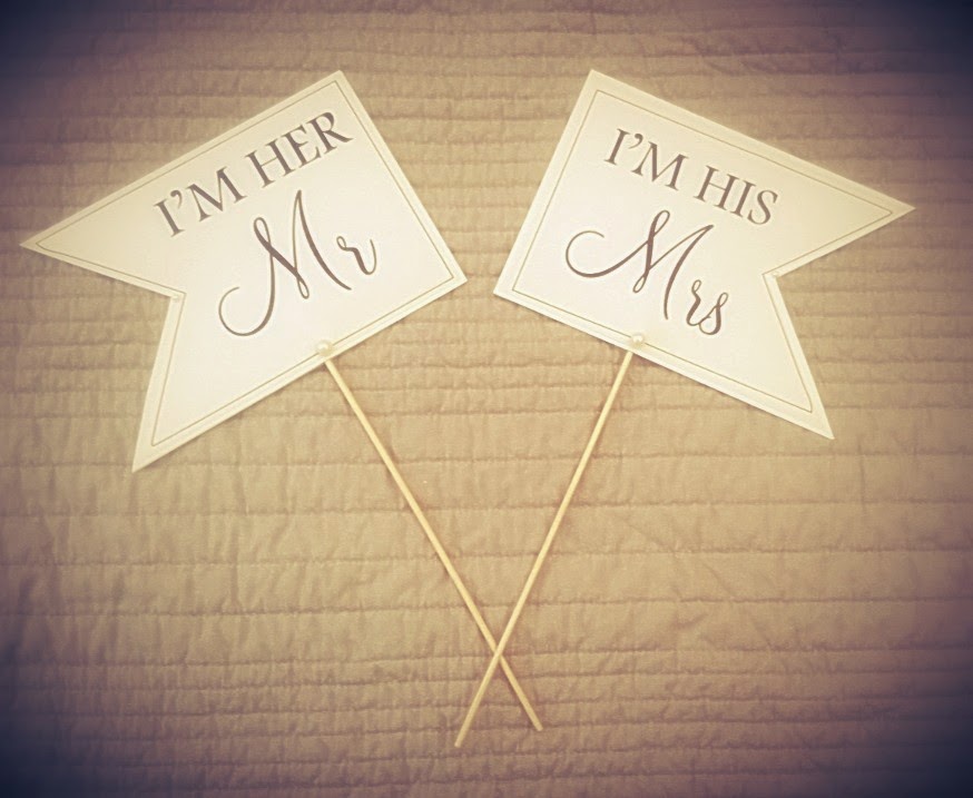 Mr & Mrs hand held signs