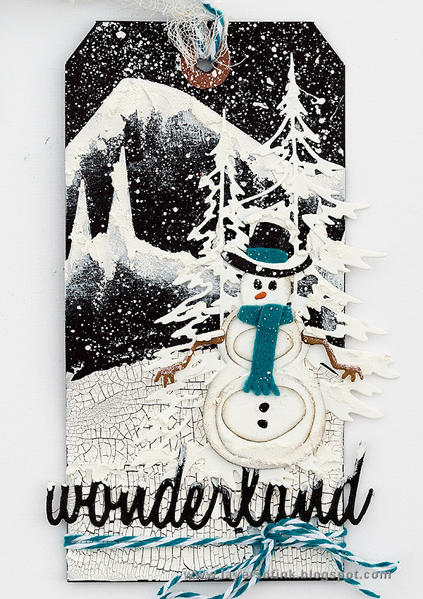 Layers of ink - Snowy Winter Tag Tutorial by Anna-Karin Evaldsson Layers of ink - Snowy Winter Tag Tutorial by Anna-Karin Evaldsson with Tim Holtz Sizzix Snowman Scene