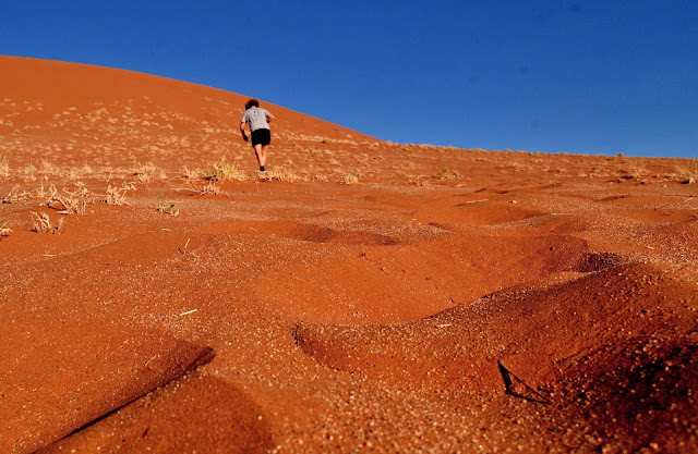Climbing up Dune 45 in Namibia
