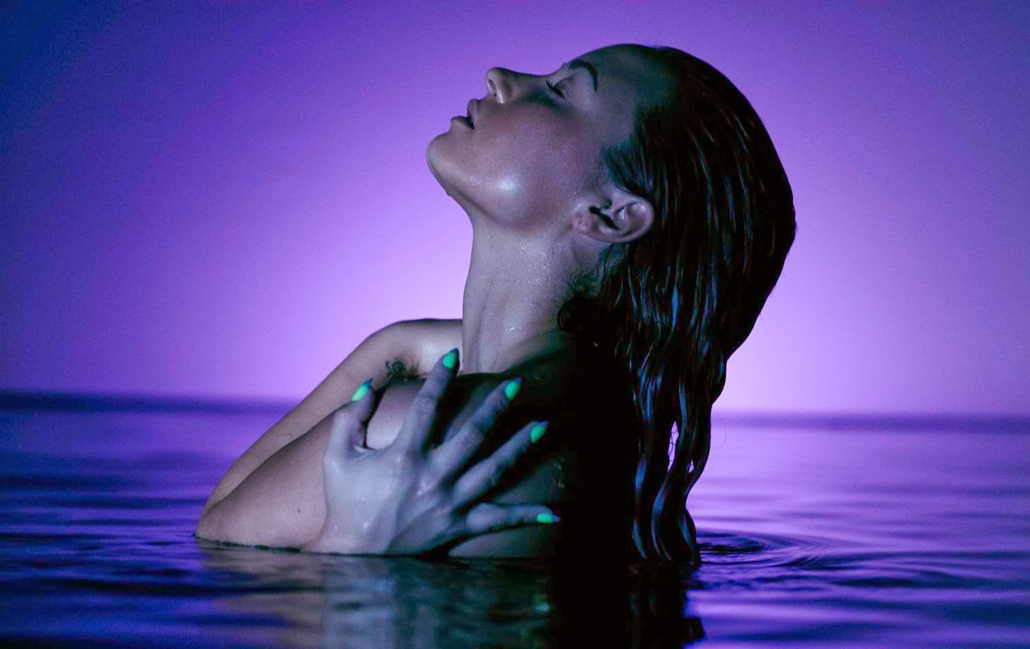 Demi Lovato Dances Naked in Pool in Neon Lights Music Video