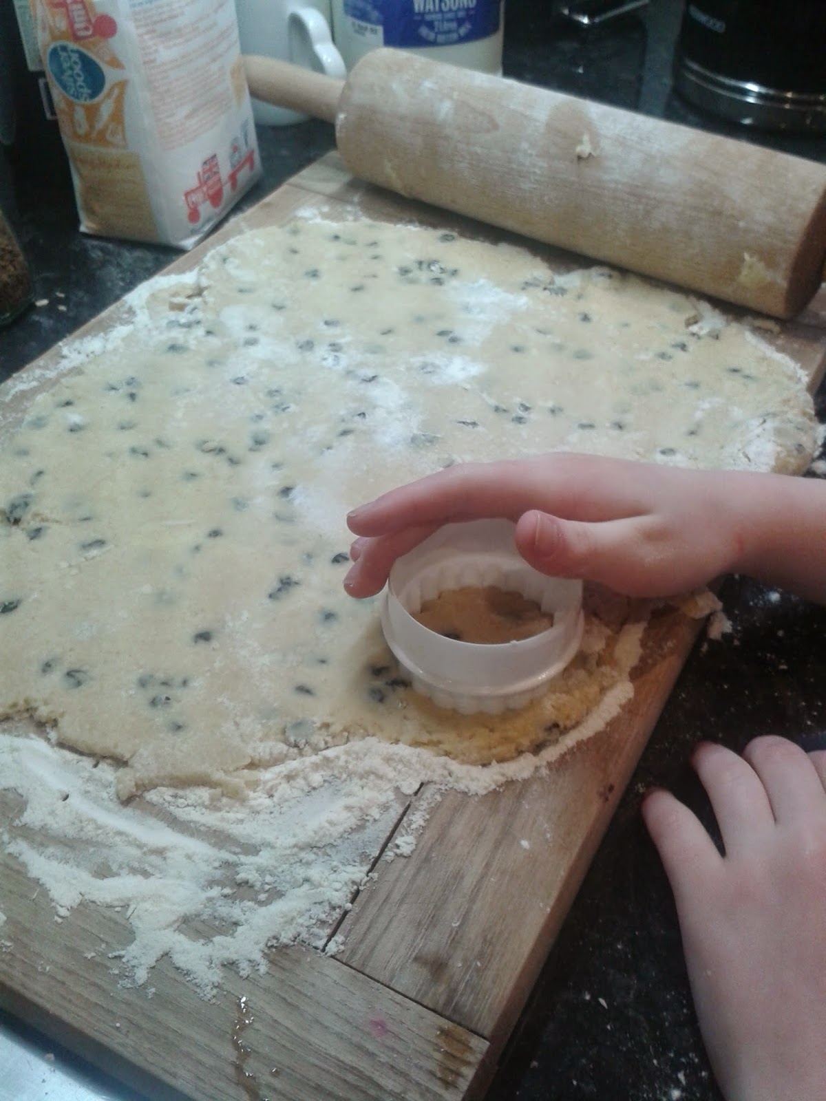 Welsh cakes recipe - Caitlin using a cutter to cut out the Welsh cakes from the dough