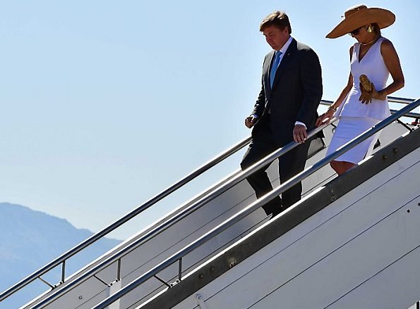 Queen Maxima visited Capo's street market in Palermo. Queen wore peplum dress. Jewelry IsabelleFa gold necklace, Prada Sunglasses