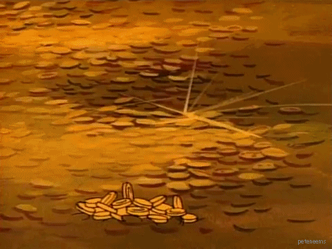 Scrooge McDuck swimming in gold coins gif
