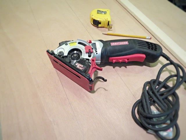 compact saw cutting lines in door