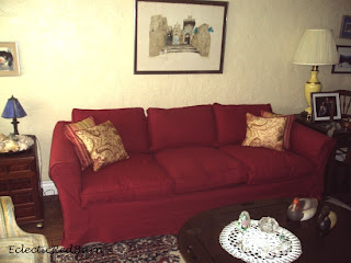 slipcovered couch, eclectic living room, stained glass lamp shade