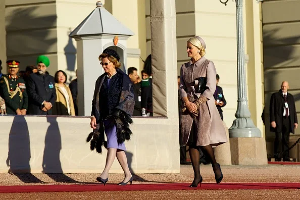Queen Sonja of Norway (L) and Princess Mette-Marit of Norway attend the official welcoming ceremony at the Royal Palace during Day-1 of the state visit from India 