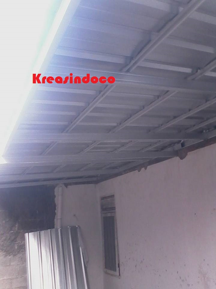 Progres Pemasangan Plafon Canopy Baja Ringan dan Kusen Aluminium di Sukahati